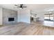 Spacious living room features an open floor plan, fireplace, and easy access to the kitchen at 5804 Maynard Ave, Las Vegas, NV 89108