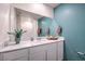 Stylish bathroom featuring a vanity with modern fixtures and decor at 6157 Aster Garden St # 153, North Las Vegas, NV 89081