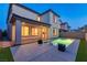 Stunning backyard showcasing a pool, lush landscaping, and spacious patio for outdoor living at 6545 Vanhoven Crest St, Las Vegas, NV 89166