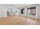 Open concept dining area with kitchen island and sliding glass doors at 6545 Vanhoven Crest St, Las Vegas, NV 89166