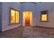 Inviting front entrance featuring a decorative door with brick pathway and gravel landscaping at 6545 Vanhoven Crest St, Las Vegas, NV 89166