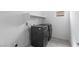 Modern laundry room with updated appliances and storage space at 6545 Vanhoven Crest St, Las Vegas, NV 89166