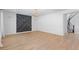 Spacious living room featuring an accent wall and staircase at 6545 Vanhoven Crest St, Las Vegas, NV 89166