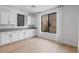Pantry with cabinets, countertop, and geometric wallpaper at 6545 Vanhoven Crest St, Las Vegas, NV 89166