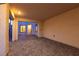 Covered back patio with stone pavers and lots of room for outdoor living and entertaining at 6545 Vanhoven Crest St, Las Vegas, NV 89166