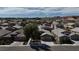 Neighborhood view featuring well maintained homes and desert landscaping at 703 Flaming Cliffs Ct, Henderson, NV 89014
