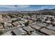 Community aerial view of homes and nearby shopping at 703 Flaming Cliffs Ct, Henderson, NV 89014