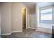 Bathroom featuring a walk-in shower and soaking tub with a large window at 703 Flaming Cliffs Ct, Henderson, NV 89014
