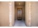 Close up of front door and entryway with stone accents at 703 Flaming Cliffs Ct, Henderson, NV 89014