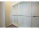 Walk-in closet boasts ample storage with built-in shelving and hanging rods at 703 Flaming Cliffs Ct, Henderson, NV 89014