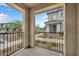 Balcony showcasing railings with a view of the street, other properties and landscaping at 7364 N Decatur Blvd # 4, Las Vegas, NV 89131
