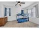 Bright bedroom with a bunk bed, dresser, and natural light from the windows at 7364 N Decatur Blvd # 4, Las Vegas, NV 89131
