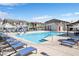 Large community pool area with chairs and well maintained grounds at 7364 N Decatur Blvd # 4, Las Vegas, NV 89131
