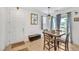 Dining room with stylish furnishings, including a modern table and comfortable seating, near front door at 7364 N Decatur Blvd # 4, Las Vegas, NV 89131