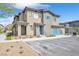 Attractive townhome with colorful accents, a private entrance, and well-kept landscaping at 7364 N Decatur Blvd # 4, Las Vegas, NV 89131