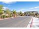 Entrance to community featuring brick pillars and wrought iron gate at 7364 N Decatur Blvd # 4, Las Vegas, NV 89131