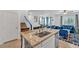 Open-concept kitchen with large island flowing into the living area, perfect for entertaining at 7364 N Decatur Blvd # 4, Las Vegas, NV 89131