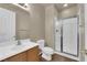 Bright bathroom features tile floors, a vanity and a shower with glass doors at 7715 Villa De La Paz Ave, Las Vegas, NV 89131