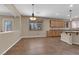 Open dining area showcases tile floors, bright windows, and easy access to the kitchen at 7715 Villa De La Paz Ave, Las Vegas, NV 89131