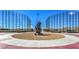 A baseball field statue stands tall against blue skies in this active community at 8429 Brackenfield Ave, Las Vegas, NV 89178