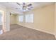 This bedroom features a ceiling fan, and a mirrored sliding closet door at 8429 Brackenfield Ave, Las Vegas, NV 89178