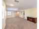 Spacious bonus room with lots of windows and a small cabinet in the corner at 8429 Brackenfield Ave, Las Vegas, NV 89178