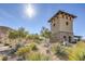 Exterior elevation showcasing well-maintained community and lush desert landscaping at 8429 Brackenfield Ave, Las Vegas, NV 89178