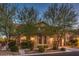 Charming two-story home with landscaped front yard, mature trees, and two-car garage at 8429 Brackenfield Ave, Las Vegas, NV 89178