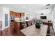 Stylish kitchen with stainless steel appliances, a central island, and an adjacent dining area at 8429 Brackenfield Ave, Las Vegas, NV 89178