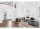 Bright, airy living room with soaring ceilings, fireplace, and elegant finishes at 8429 Brackenfield Ave, Las Vegas, NV 89178
