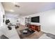 Cozy living room featuring plush seating, a media center, and an open layout at 8429 Brackenfield Ave, Las Vegas, NV 89178