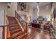 Beautiful stairway leading to the living room with fireplace and high ceilings at 8429 Brackenfield Ave, Las Vegas, NV 89178
