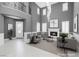 Bright, airy living room with soaring ceilings, fireplace, and elegant finishes at 8429 Brackenfield Ave, Las Vegas, NV 89178