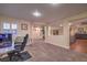 Open loft with carpet, shutters, and an area for study at 8429 Brackenfield Ave, Las Vegas, NV 89178