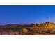 Expansive desert landscape with mountain views from the backyard of this home at 8429 Brackenfield Ave, Las Vegas, NV 89178