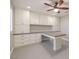 Organized home office with ample cabinetry, built-in desk, and neutral color scheme for productive workspace at 8429 Brackenfield Ave, Las Vegas, NV 89178