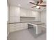 Functional office space with built-in cabinets, ample storage, and a neutral color palette at 8429 Brackenfield Ave, Las Vegas, NV 89178