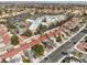 Expansive aerial view of residential area showcases numerous townhomes and landscaped common areas at 8552 Desert Holly Dr, Las Vegas, NV 89134