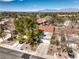Aerial view of the home showcasing its manicured yard and neighborhood at 8552 Desert Holly Dr, Las Vegas, NV 89134