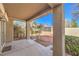 Back porch with a covered patio and a landscaped backyard at 8552 Desert Holly Dr, Las Vegas, NV 89134