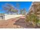Well maintained backyard with desert landscaping and gravel at 8552 Desert Holly Dr, Las Vegas, NV 89134