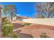 Well maintained backyard with desert landscaping and gravel at 8552 Desert Holly Dr, Las Vegas, NV 89134