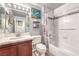 Bathroom features a tub, updated vanity, and stylish fixtures at 8552 Desert Holly Dr, Las Vegas, NV 89134