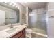 Modern bathroom with a glass shower, updated vanity, and stylish fixtures at 8552 Desert Holly Dr, Las Vegas, NV 89134