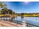 Picturesque pond view overlooking the golf course, creating a serene backdrop for a waterfront lifestyle at 8552 Desert Holly Dr, Las Vegas, NV 89134
