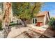 Beautiful backyard featuring a patio, mature tree providing shade, and outdoor bar area at 8851 Quintane Ln, Las Vegas, NV 89123