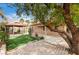 Spacious backyard featuring mature landscaping and a decorative gazebo at 8851 Quintane Ln, Las Vegas, NV 89123