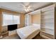 This bedroom features neutral walls, carpeted floors, and a built in murphy bed at 8851 Quintane Ln, Las Vegas, NV 89123