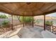 Backyard gazebo featuring brick-paved flooring and decorative railings at 8851 Quintane Ln, Las Vegas, NV 89123