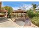 Backyard gazebo perfect for outdoor living and relaxation, surrounded by landscaping and privacy at 8851 Quintane Ln, Las Vegas, NV 89123